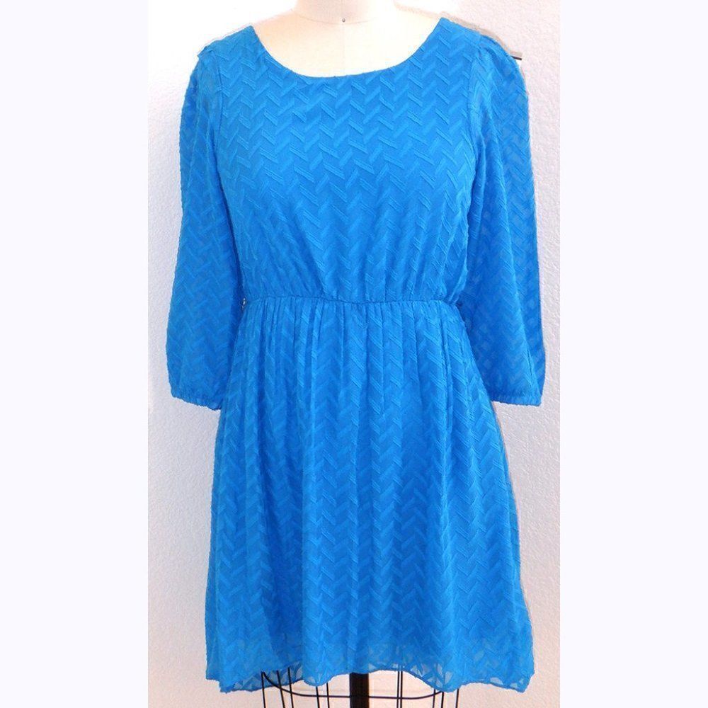 Emily West London blue dress